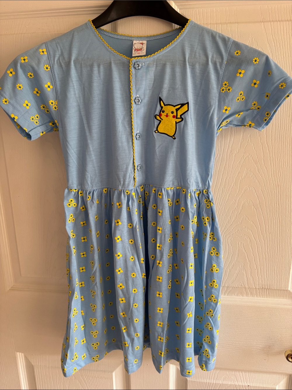 NWOT Pokémon Pikachu dresses. Bundle: Size 12 blue, size 12 pink, size 10 blue.